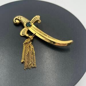 Coro Vintage Signed Gold Tone‎ Sword Dagger Brooch With Tassels and Green Stone